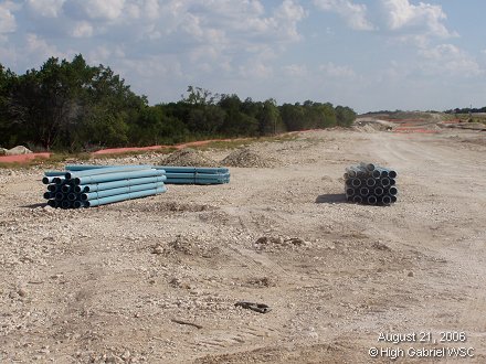 New stacks of 6-inch plastic pipe
