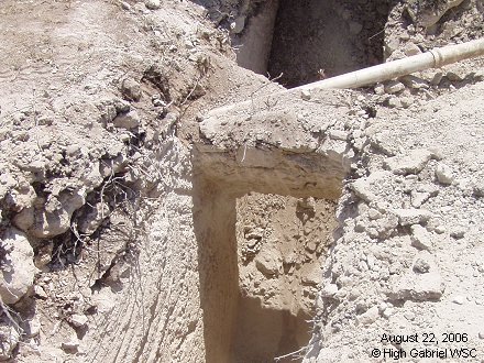 Trench under the existing water line